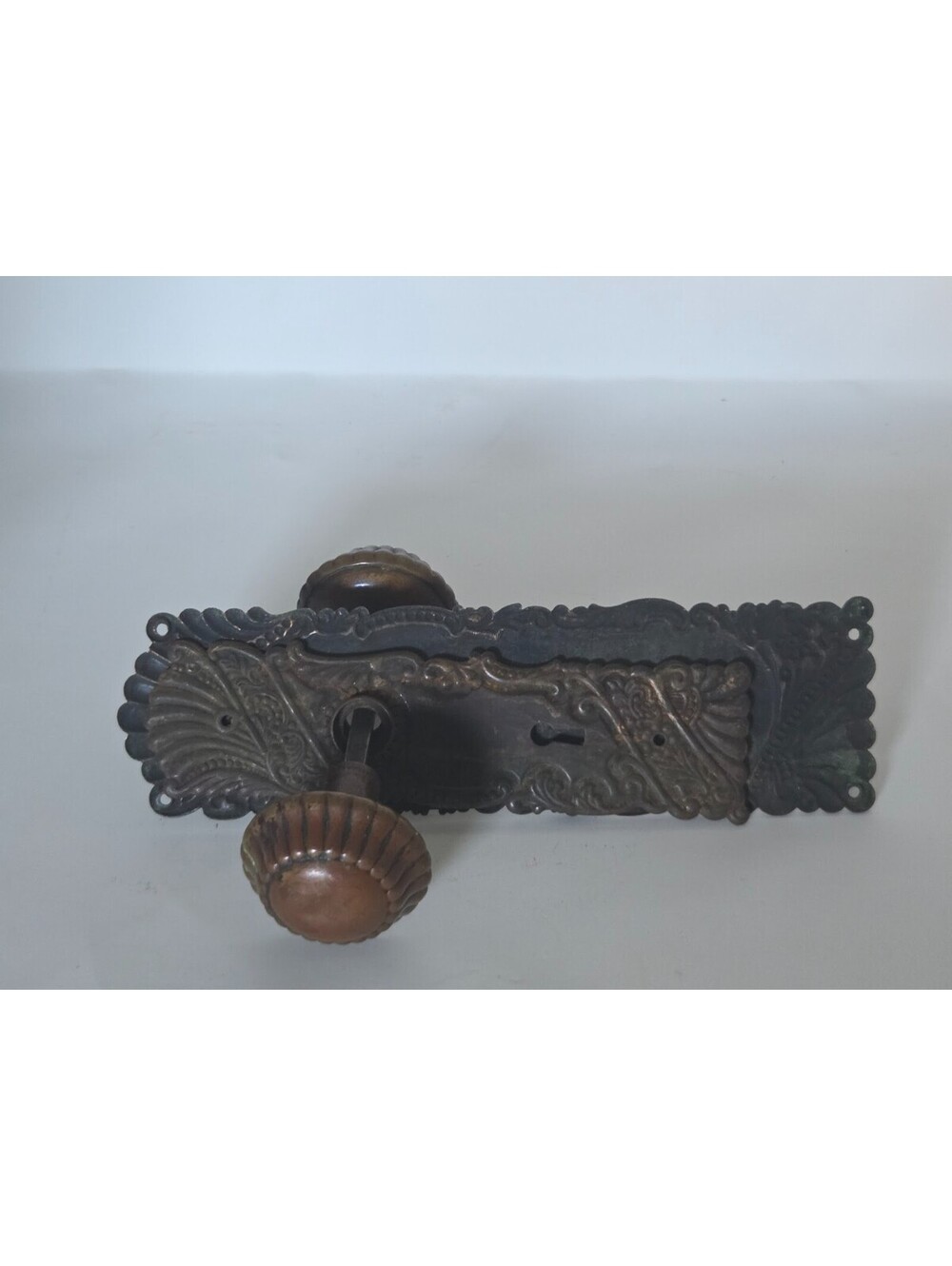 Antique Bronze Mortise Lockset With Ornate Backplates And Decorative Door Knobs